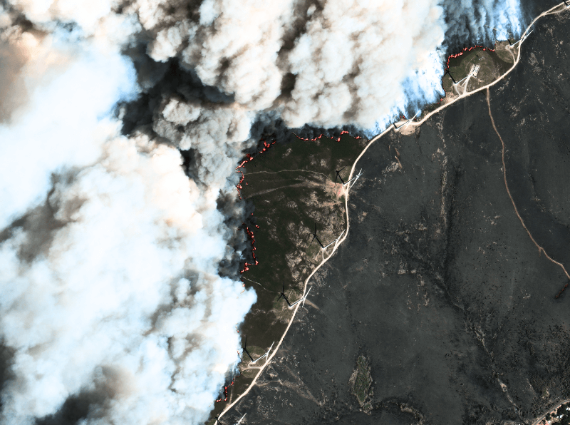Satellite image of a progressing wildfire