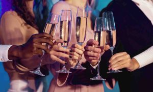 people clinking glasses